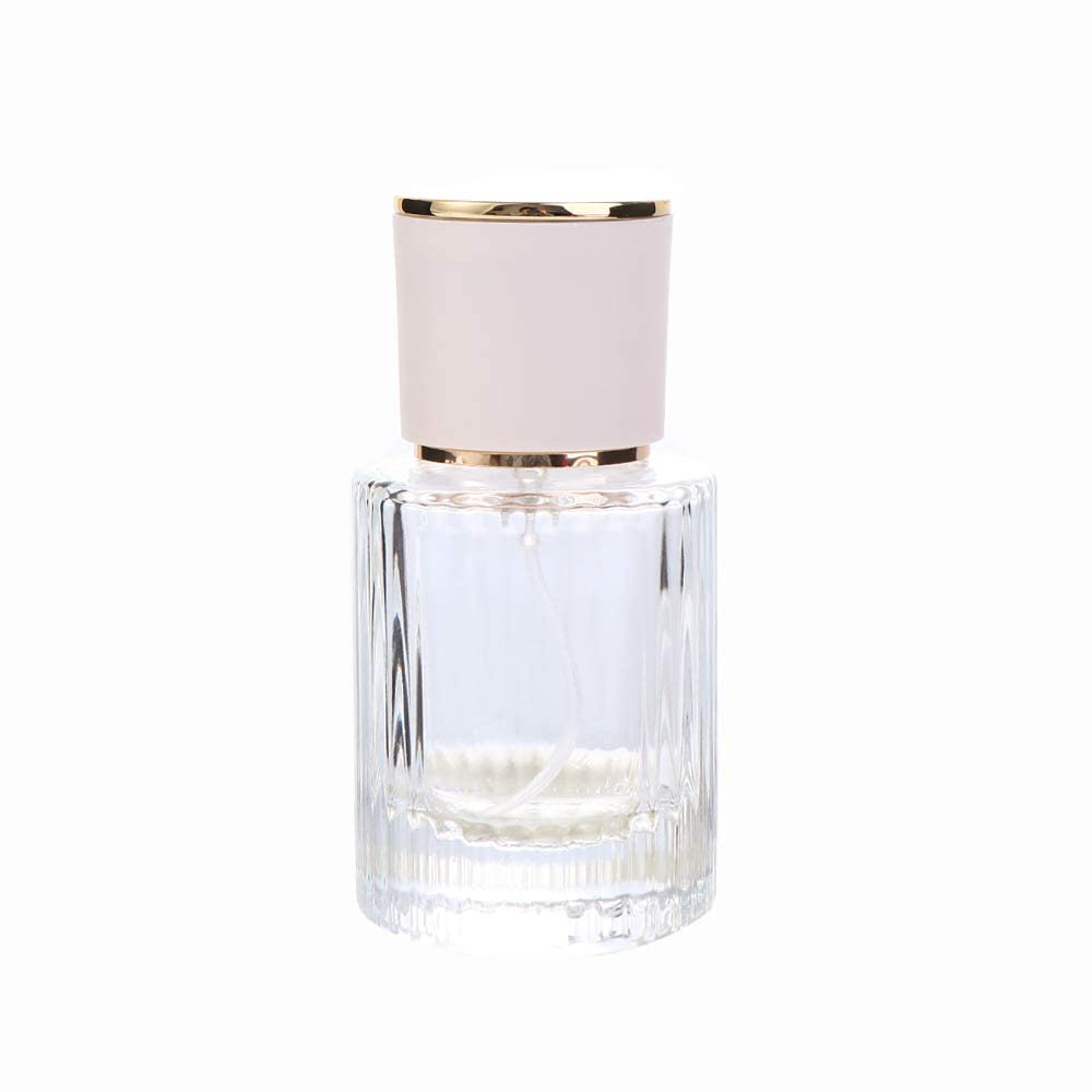 Botella de perfume de vidrio con rayas verticales