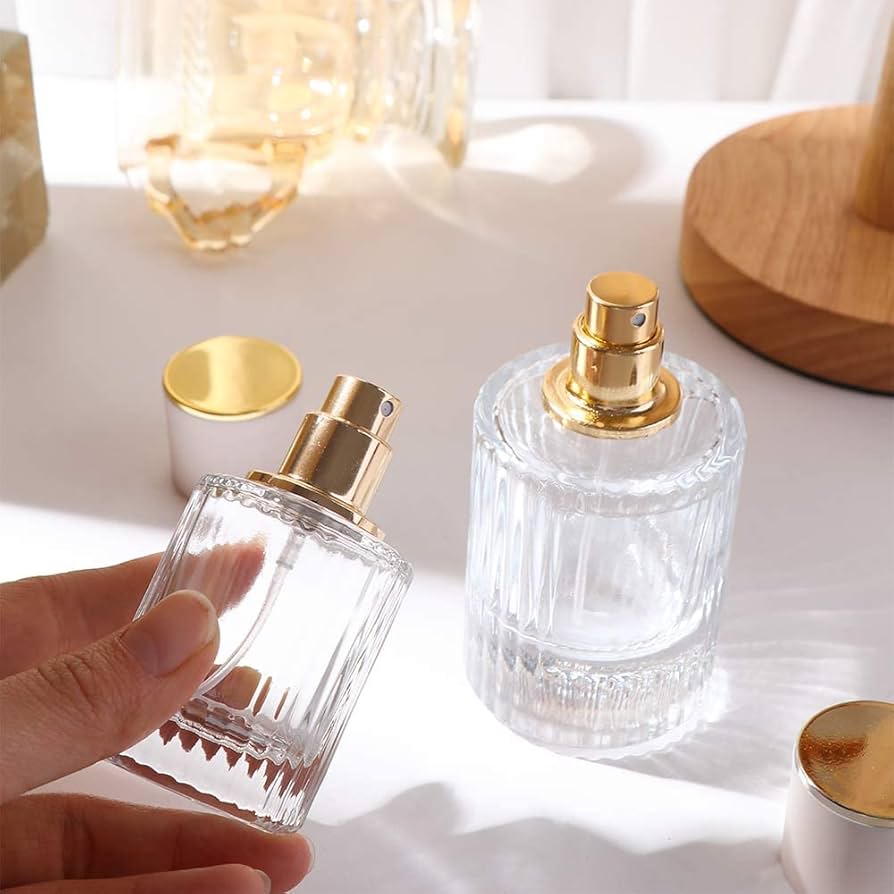 Botella de perfume de vidrio con rayas verticales